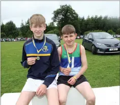  ??  ?? U16 Long Jump: David Phipps (second ) and Christy Mooney (first ).