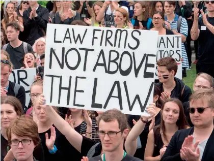  ?? Photo / File ?? Students at Victoria University of Wellington protest against sexual harassment in the legal fraternity.