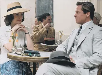  ??  ?? Brad Pitt and Marion Cotillard in Allied