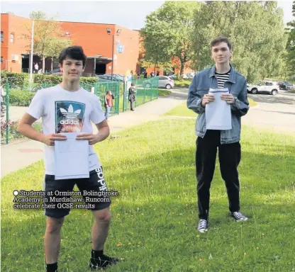  ??  ?? Students at Ormiston Bolingbrok­e Academy in Murdishaw, Runcorn celebrate their GCSE results