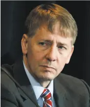  ?? Brennan Linsley / Associated Press 2015 ?? Director Richard Cordray has faced pressure.