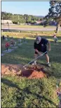  ?? Contribute­d photo ?? Donny Sorrells fills in his mother’s sunken gravesite at Oaknoll Memorial Gardens himself on Oct. 1, more than six weeks after her burial.