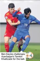  ??  ?? Ben Davies challenges Azerbaijan’s Tamkin Khalilzade for the ball.
