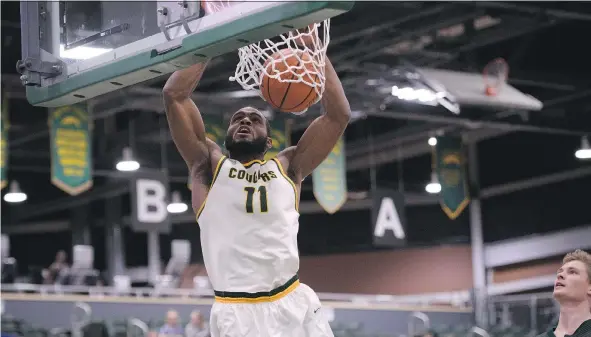  ?? ARTHUR WARD/ARTHUR IMAGES ?? University of Regina Cougars forward Brian Ofori has not only improved himself on the court, he’s always looking for avenues for personal growth as well.