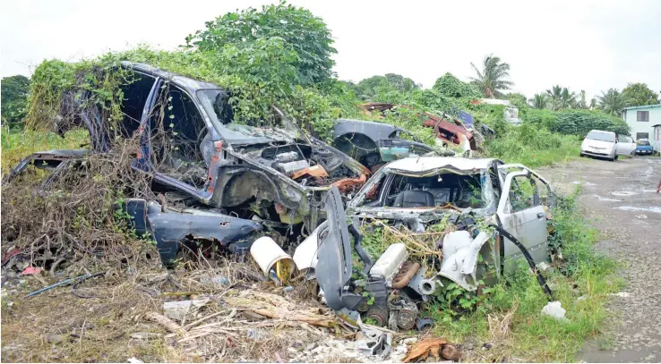  ?? Photo: Ronald Kumar ?? Wrecked vehicles dumped near Malolo settlement by the Nasinu Town Council are a health and safety risk for the residents.