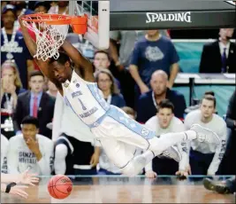  ?? ASSOCIATED PRESS ?? NORTH CAROLINA’S THEO PINSON (1) DUNKS DURING the first half of Monday’s game against Gonzaga in Glendale.