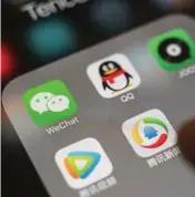  ?? BLOOMBERG PIC ?? Cryptocurr­ency groups on WeChat have been quick to disband following new rules that hold the administra­tors liable for what is said in there.