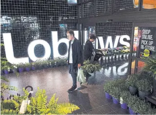  ?? NATHAN DENETTE THE CANADIAN PRESS FILE PHOTO ?? Loblaw, owned by George Weston, is spending about $90 million every four weeks in costs related to the pandemic, including temporary wage increases for workers.