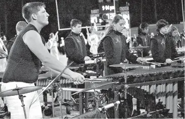  ?? Staff photos by Neil Abeles ?? In the pit playing percussion during halftime is Rabbit football player Mitch Hardaway. Other players are, from left, Kason Kennedy, Jordan Soloman, Lydia Rougeau and Hayden Graves.
