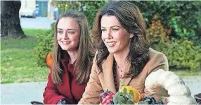  ?? WB ?? Alexis Bledel and Lauren Graham in “Gilmore Girls.”