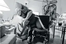  ?? PHOTOS: PHIL CARPENTER/POSTMEDIA NEWS ?? Diabetic double amputee Raymond Giard, 83, transfers himself from his living-room seat to the wheelchair in his Laval apartment. He said he chooses not to use prosthetic limbs because the right one fits awkwardly and has a balky knee mechanism. ‘One...