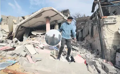  ?? Picture: AFP ?? SOMETHING SAVED. A Palestinia­n man carries a mirror recovered from debris following Israeli bombardmen­t in Rafah in the southern Gaza Strip yesterday, amid the ongoing conflict between Israel and Hamas.