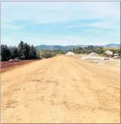  ?? PICTURE / NRC ?? New emergency spillway/stopbankin­g under constructi­on in Kaitaia, where the Firth concrete plant used to be.