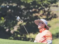  ??  ?? Ben Ikin plays a shot out of the bunker.