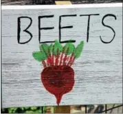  ?? EMILY RYAN — FOR DIGITAL FIRST MEDIA ?? A hand-painted sign marks a bed of beets.