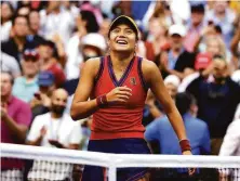  ?? Al Bello / TNS ?? Emma Raducanu, 18, of Britain celebrates her victory over Leylah Fernandez of Canada in the U.S. Open singles final.