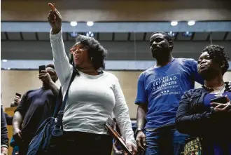  ?? Shaban Athuman / Dallas Morning News ?? Activist Olinka Green was among protest leaders calling for a civilian-run police review board with the power of subpoena Wednesday during a Dallas City Council meeting.