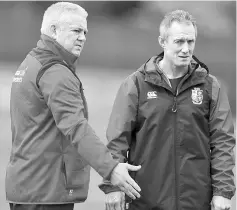  ??  ?? British & Irish Lions head coach Warren Gatland (left) and coach Rob Howley during training at Carton House, Co. in Kildare, Ireland. — Reuters photo