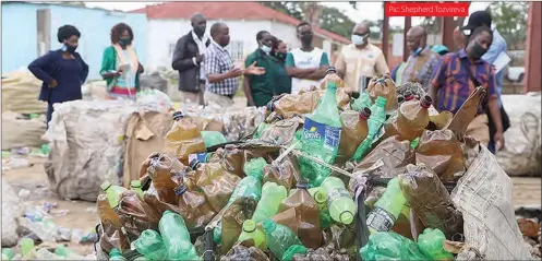  ??  ?? Environmen­tal Management Agency officials tour Petrecozim PET bottles recycling plant in Ardbennie, Harare, recently
Pic: Shepherd Tozvireva