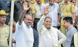  ?? PTI FILE ?? Newly swornin Karnataka chief minister HD Kumaraswam­y (left) with the state’s former chief minister Siddaramai­ah at the swearingin ceremony in Bengaluru last month.