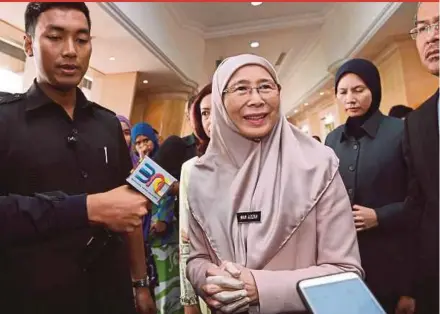  ?? BERNAMA PIC ?? Deputy Prime Minister Datuk Seri Dr Wan Azizah Wan Ismail talking to reporters after the first National Finance Council meeting at the Finance Ministry in Putrajaya yesterday.