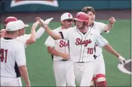  ?? Eric Gay / Associated Press ?? Fairfield’s Dan Ryan (10) celebrates with teammates after scoring against Southern in the fourth inning of an NCAA college baseball tournament regional game on Saturday in Austin, Texas.