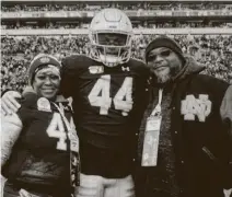  ?? Courtesy of Jones family ?? Parents Lakiescha and Matthew Jones attend their son Jamir’s senior day at Notre Dame last fall.