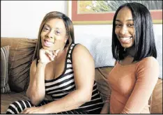  ?? AP ?? Iisha Brown (left) and her daughter Olivia Brown, 17, worry that with a criminal record, Olivia’s chance at a successful life is ruined. North Carolina has treated teens over the age of 15 as adults in its courts system.