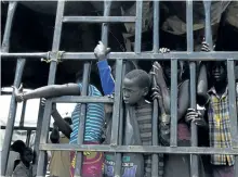  ?? THE ASSOCIATED PRESS FILES ?? South Sudanese children arrive at the Imvepi refugee settlement in Uganda. More than 1 million children have fled South Sudan’s civil war, the UN says.