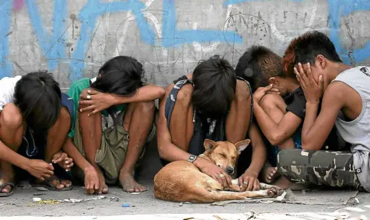  ?? —RICHARD A. REYES ?? VICTIMS TWICE-OVER? A human rights lawyer has criticized PDEA for its harsh treatment of 12 children aged 4 to 15 during an antidrug operation in Navotas. The minors were reportedly being used to sell drugs in the fish port area.