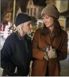  ?? COURTESY OF HULU ?? Kristen Stewart, left, and Mackenzie Davis in a scene from “Happiest Season.”