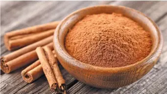  ?? DREAMSTIME/TNS ?? Cinnamon is sourced from the inner bark of various species of cinnamon trees. Strips of the bark are dried and rolled into sticks, ground into a powder, or made into an extract.