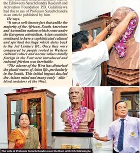  ??  ?? The wife of Professor Sarachchan­dra near the Bust. with D.S. Edirisingh­e