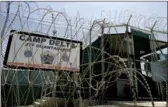  ?? JOE SKIPPER / REUTERS ?? The front gate of Camp Delta is shown at the Guantanamo Bay Naval Station in Cuba in 2007.