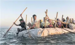  ?? ?? Fleeing Rohingya refugees cross the Naf River, which divides Bangladesh from Myanmar, near Teknaf, Bangladesh, in November 2017. A Kyaw Thaung company signed a deal to supply the Tatmadaw with a coastal radar technology system that could be used to track small craft.