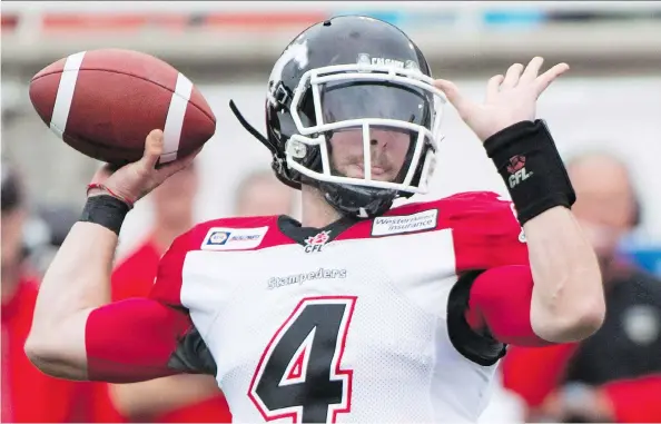  ?? GRAHAM HUGHES/THE CANADIAN PRESS/FILE. ?? Quarterbac­k Drew Tate, shown with the Calgary Stampeders in 2014, is the latest addition to the Saskatchew­an Roughrider­s.