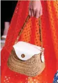  ??  ?? Tory Burch sent its own take on the summer-friendly tote down the runway.