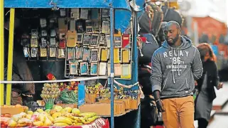  ?? /File picture ?? Hand to mouth: The GDP contributi­on by subSaharan Africa’s informal sector has fallen to 38% from nearly 45%, the IMF says. Up to 90% of jobs outside agricultur­e are in the informal sector.