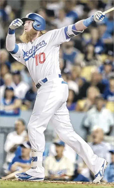  ?? Robert Gauthier Los Angeles Times ?? JUSTIN TURNER GOT the Dodgers going in the first inning with a three-run home run into the left-field pavilion.