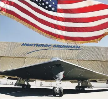  ?? Al Seib Los Angeles Times ?? NORTHROP Grumman’s deal for Orbital ATK is valued at $7.8 billion. Northrop is best known for its bombers, drones and other military equipment. Above, a bomber at Northrop’s Palmdale plant in 2014.