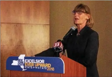  ?? PAUL POST -- PPOST@DIGITALFIR­STMEDIA.COM ?? Terri Egan, acting state Department of Motor Vehicles commission­er, discusses state budget initiative­s during a presentati­on at Crandall Public Library in Glens Falls on Monday.