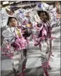  ?? SILVIA IZQUIERDO — AP ?? Children from the Mangueira samba school parade during Carnival celebratio­ns in Rio de Janeiro.