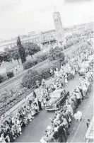  ?? Photo / Hawke’s Bay Knowledge Bank ?? As part of the royal visit to Hastings in 1954 the town welcomed Queen Elizabeth II and the Duke of Edinburgh with a street parade.