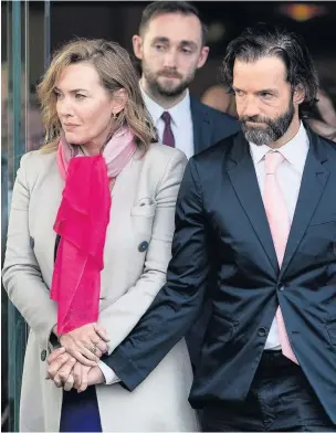  ??  ?? Actress Kate Winslet and her husband Edward Smith leave Accrington Crematoriu­m after the funeral of Haslingden mum Gemma Nuttall