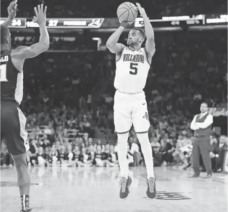  ?? DANNY WILD/USA TODAY SPORTS ?? Villanova guard Phil Booth says the team motto is “shoot them up and sleep in the streets.”