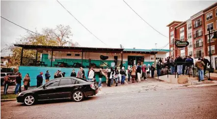  ?? Austin CVB ?? The lines that form outside Franklin Barbecue in Austin are nearly as famous as Aaron Franklin’s smoked meats.