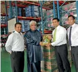  ??  ?? Petroleum Resources Developmen­t Minister Arjuna Ranatunga at the event marks the first export of locally blended Chevron lubricants to Pakistan with Managing Director Kishu Gomes and other Chevron Lubricants Lanka PLC officials