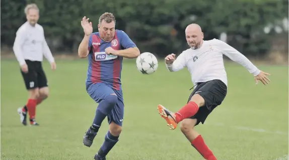  ??  ?? Sunderland Hall Farm (navy) take on Gateshead Redheugh at Leyburn Grove, Houghton, on Saturday.