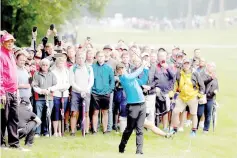  ?? — Reuters photo ?? McIlroy in action during the first round of BMW PGA Championsh­ip at Wentworth Club, Virginia Water.