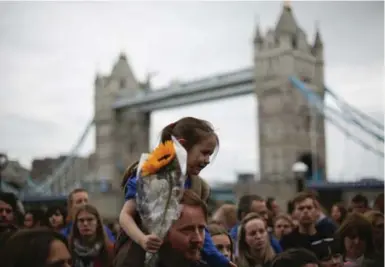  ?? DANIEL LEAL-OLIVAS/AFP/GETTY IMAGES ?? “In the wake of yet another tragedy, love and unity have once again overpowere­d hate and division,” Fasih Malik writes.